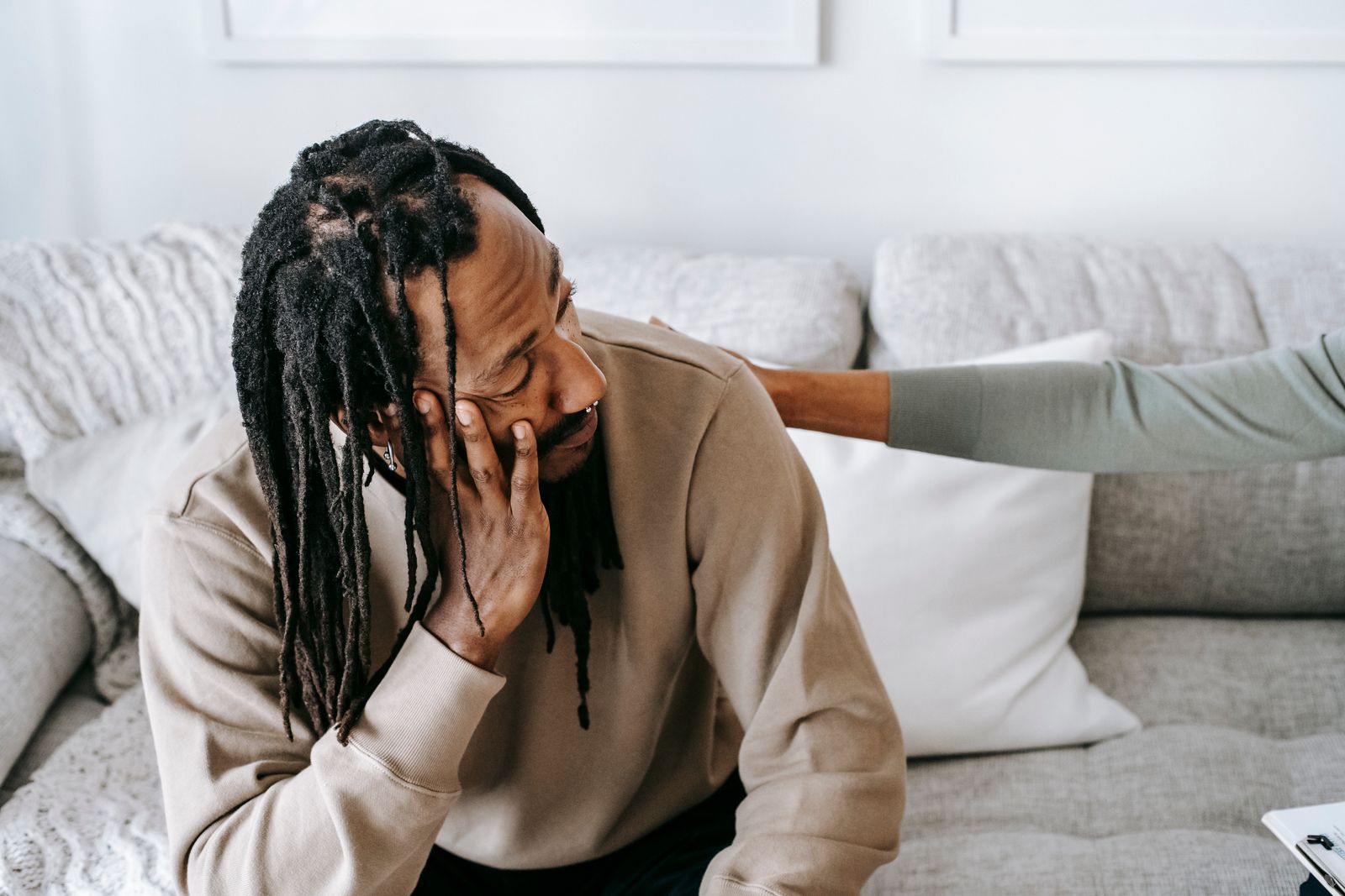 Two people talking openly across a table
